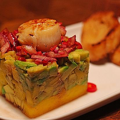 Scallops on avocado Mango Salad with onion Vinaigrette